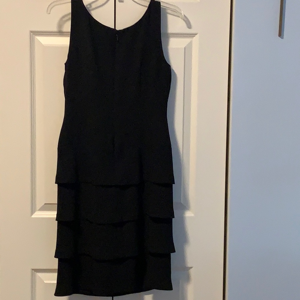 Women’s sleeveless black cocktail dress